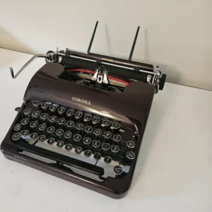 circa 1937 'speedline' standard / silent/ sterling working vintage typewriter in rare maroon with case